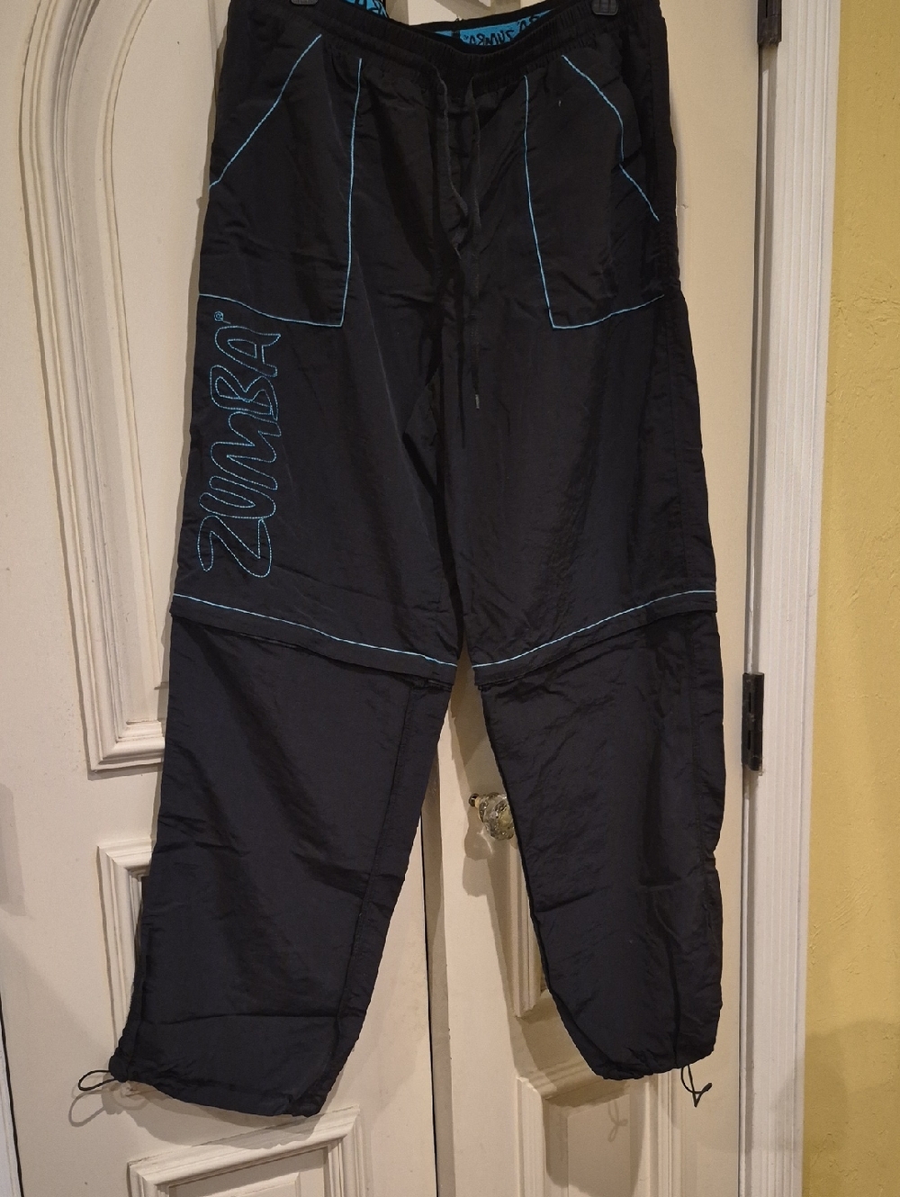 Zumba Fitness Black Joggers with Blue Contrast Stitching. Zipper To Short